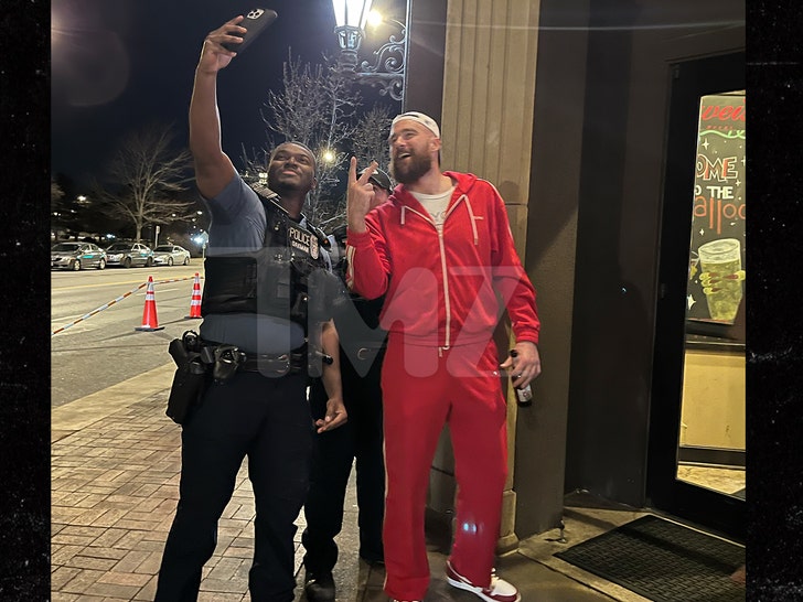 Travis Kelce Takes Picture at Restaurant with Cop After Kansas Metropolis Parade Taking pictures
