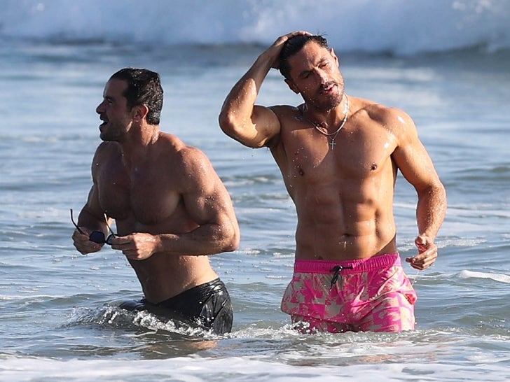 Chris Appleton & New Boyfriend Splash Round for Shirtless Seaside Date