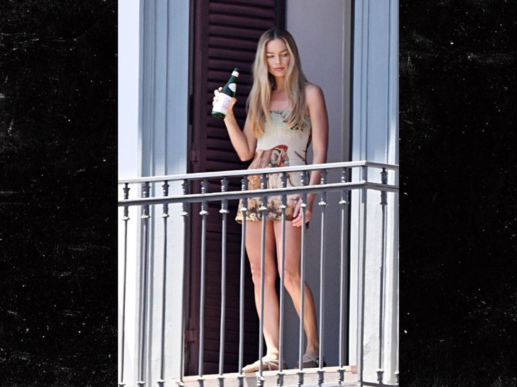 Margot Robbie and Tom Ackerley Look Liked-Up on Balcony in Italy