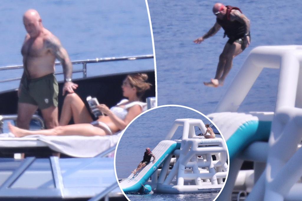 Joe Rogan launches himself off inflatable slide throughout megayacht trip with spouse Jessica Ditzel, youngsters