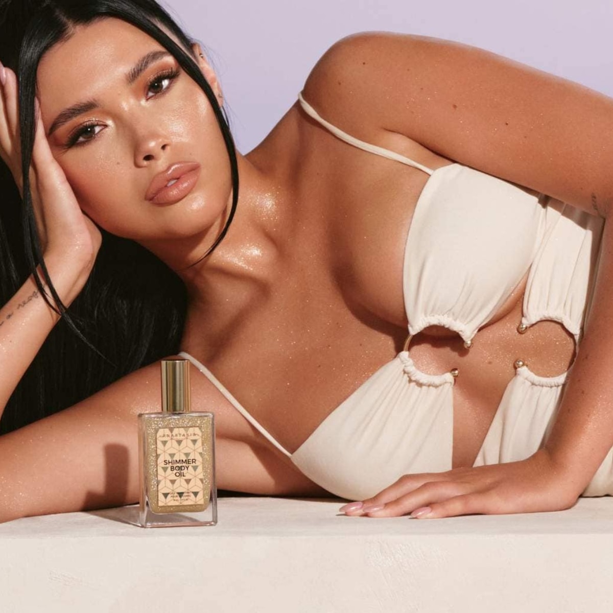 TikTok’s Favorite Shimmering Body Oil Trend Is Giving Golden-Hour Skin