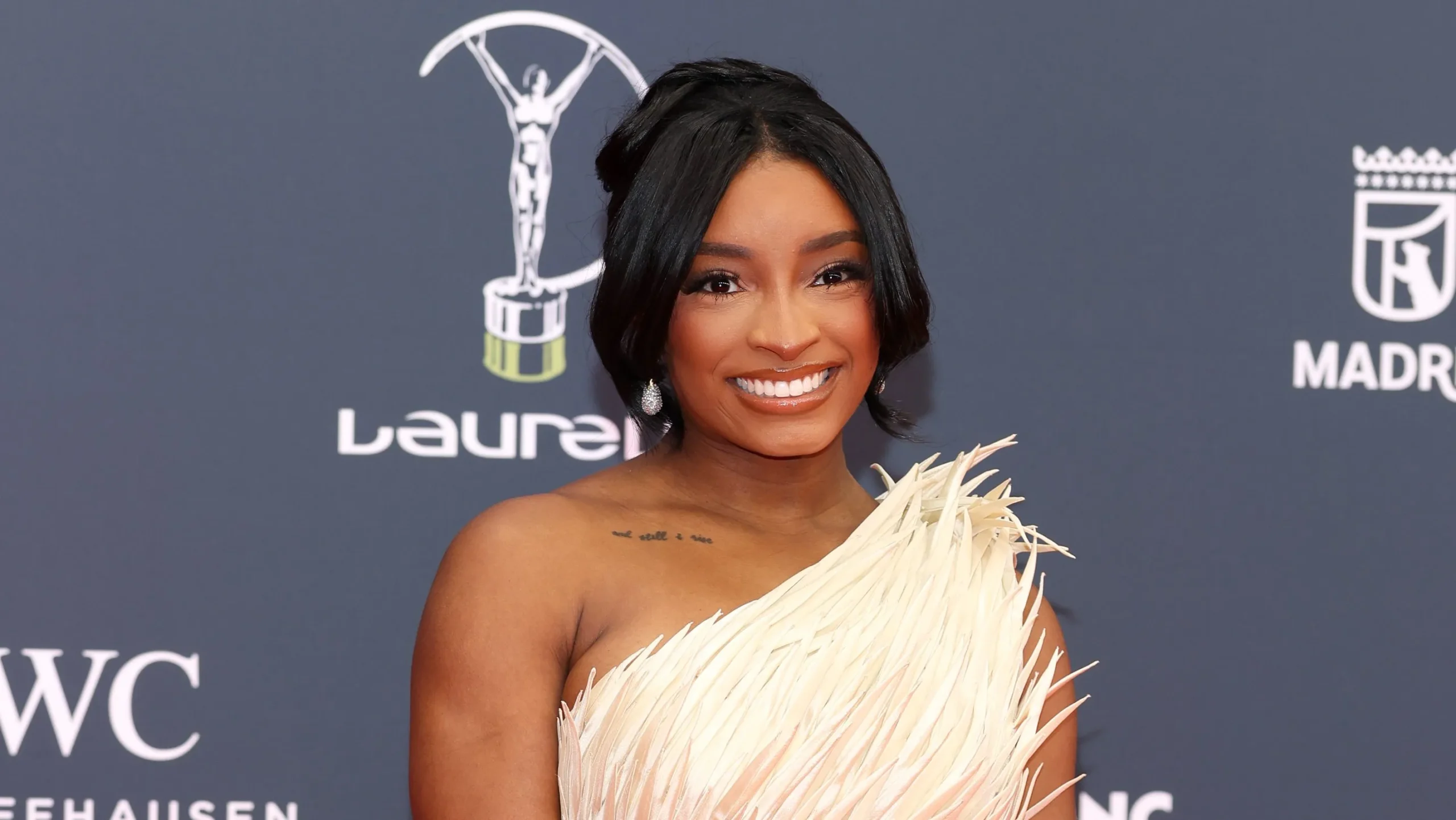 How Long Have Simone Biles & Taylor Swift Friends? Her Wedding Invite & More