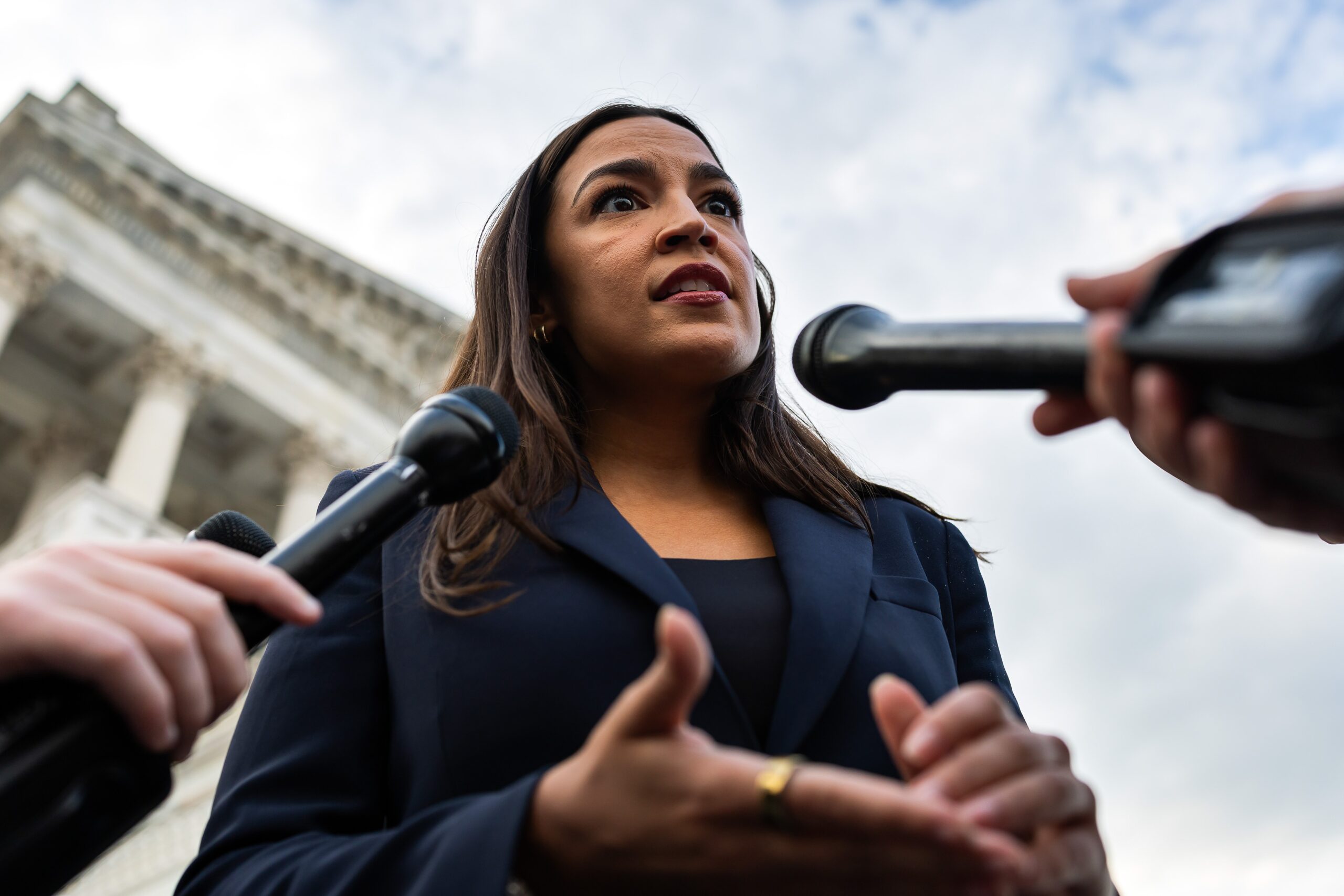 Why Is AOC Boycotting Ed Sheeran? Inside the Macklemore Tour Firestorm