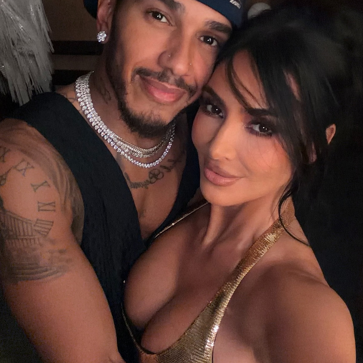 Kim Kardashian, Lewis Hamilton Share Steamy Kiss in Romantic Paris Pic