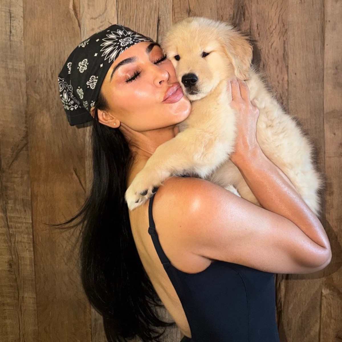 Kim Kardashian’s Daughter Cuddles With Puppy Gifted by Lewis Hamilton